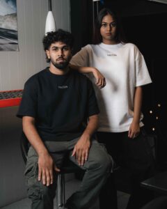 Black oversized heavy cotton t-shirt 240 GSM with embroidered logo, front view flat lay